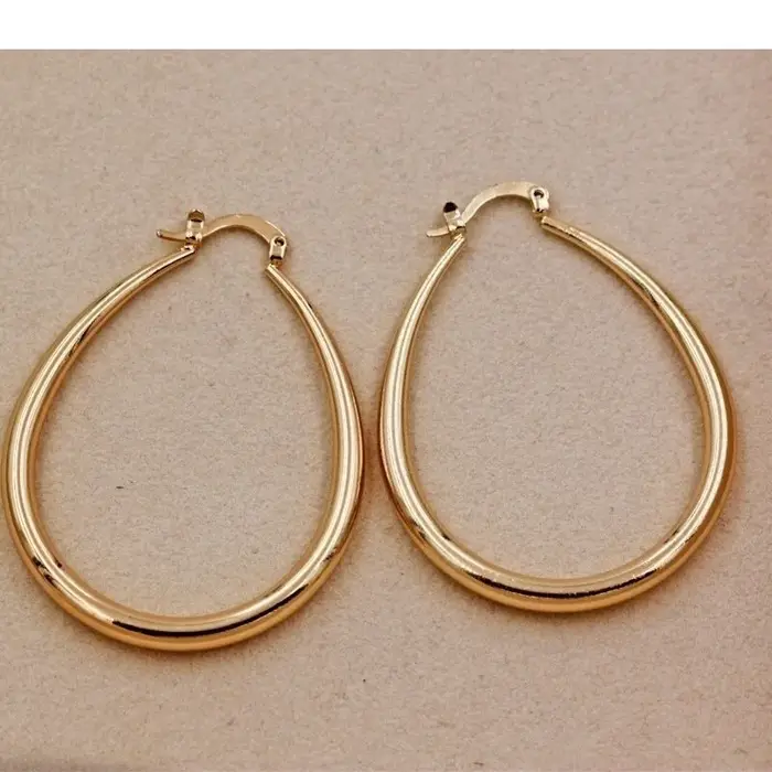 Boucles d'oreilles créoles lisses en or brillant pour femmes