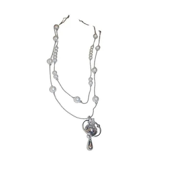 Collier de perles en forme de goutte d'eau saturne incrustée de diamants