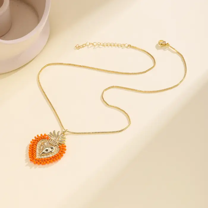 Nidin – collier avec pendentif en forme de cœur sacré