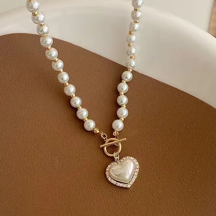 Nouveau collier élégant en perles d'imitation vintage pour femmes, colliers de luxe en perles d'imit