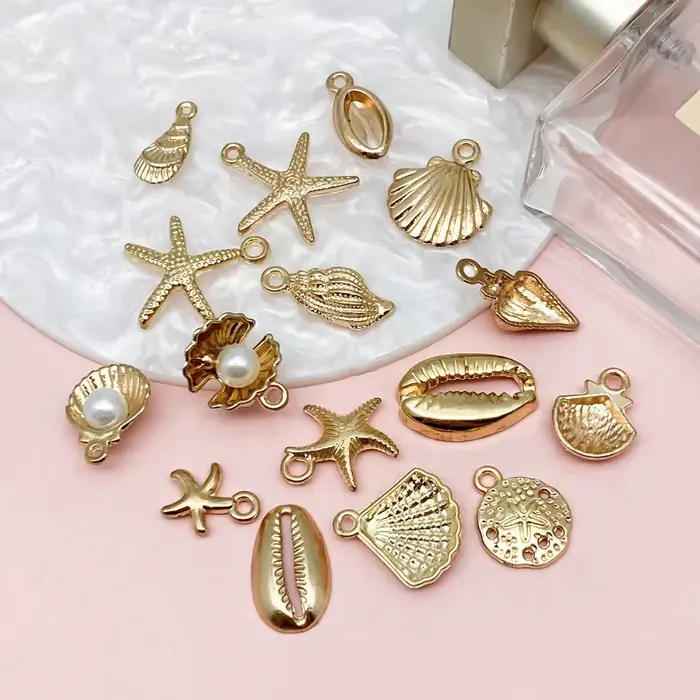 Nouveau 16 pièces couleur or océan coquille conque étoile de mer breloques pour la fabrication de bijoux collier porte-clés chaîne de téléphone bricolage matériaux Colorfast