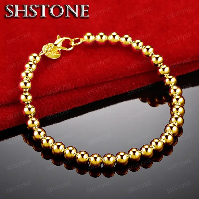 Bracelet en or 18 carats avec perles de 6 mm