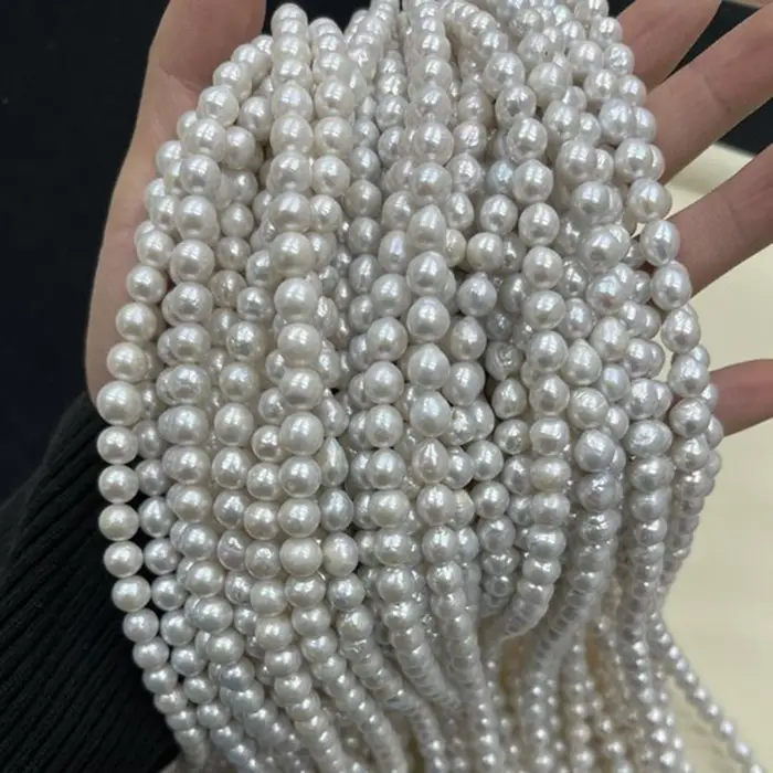 Perles naturelles 8-9mm AAAA rondes lisses d'eau douce blanches