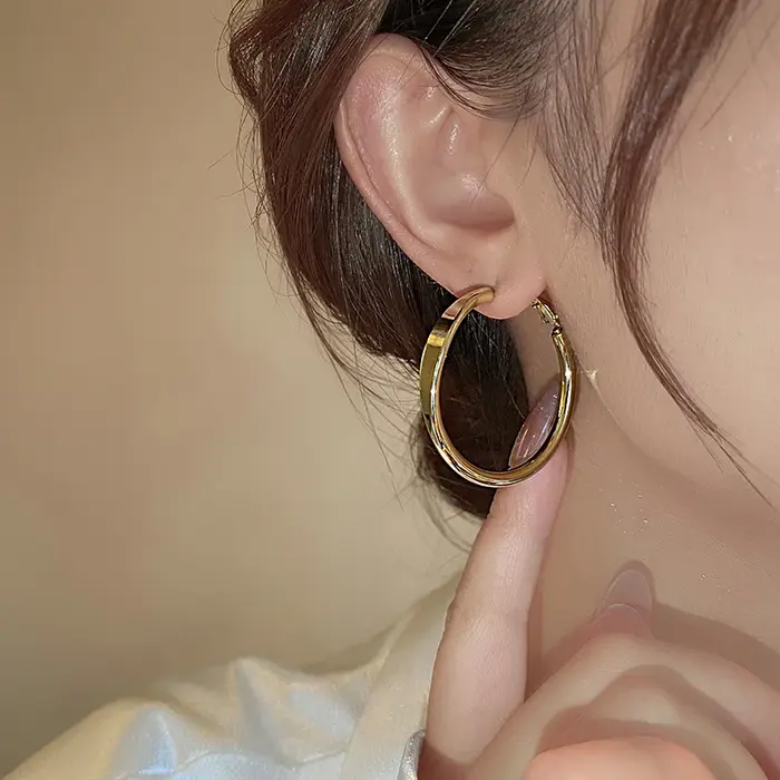 Boucles d'oreilles circulaires simples plaquées or 18 carats