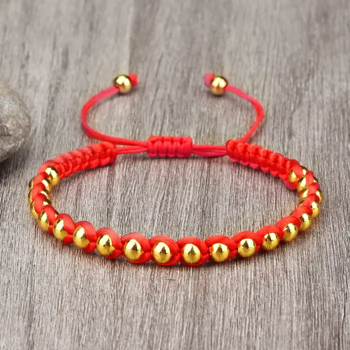 Bracelet Tressé Porte-Bonheur RaeRina en Corde Rouge et Perles en Cuivre Pour Homme et Femme Occasions Spéciales