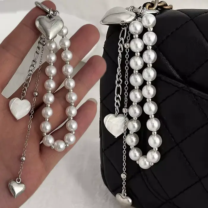 Nouveau porte-clés chaîne de perles 2025 nouveau coeur de pêche perle sac chaîne pendentif bijoux accessoires perle porte-clés cadeaux décor