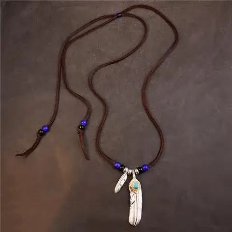 Collier en corde de cuir avec pendentif Turquoise en plumes rétro indiennes