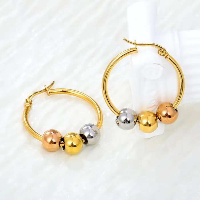 Boucles d'oreilles créoles Huggie à trois billes bicolores Or et Argent en Acier Inoxydable 316L