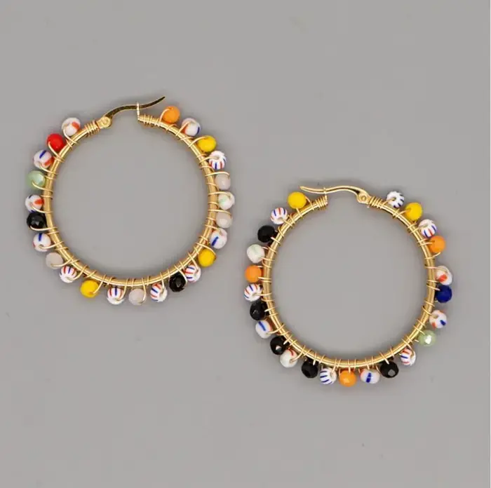 Boucles d'oreilles grand cercle, exagération, tissé à la main, originalité moyenne, ethos bohème, bi
