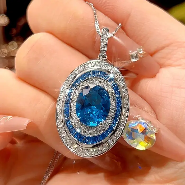 Bague ovale de luxe en saphir bleu réglable