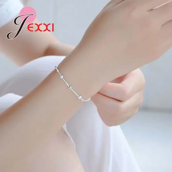 Bracelet en argent sterling 925 avec zirconium blanc et perle de chance pour femmes élégantes occasions spéciales partys soirées mariage anniversaire