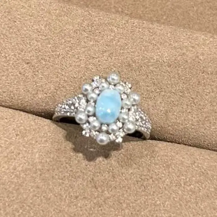 Bague romantique en pierre marine sertie de diamants et perles pour mariage occasions spéciales femmes elegance