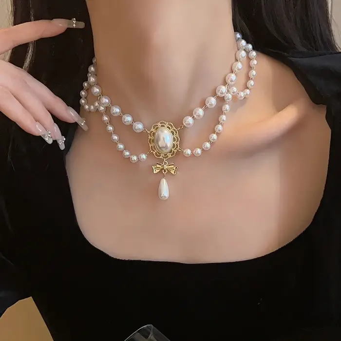 Collier à pampilles en perles baroques rétro pour femmes