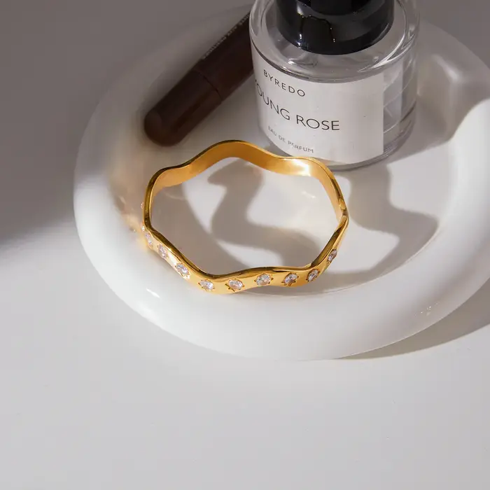 Uworld – Bracelet classique à courbes ondulées avec zircon rond blanc
