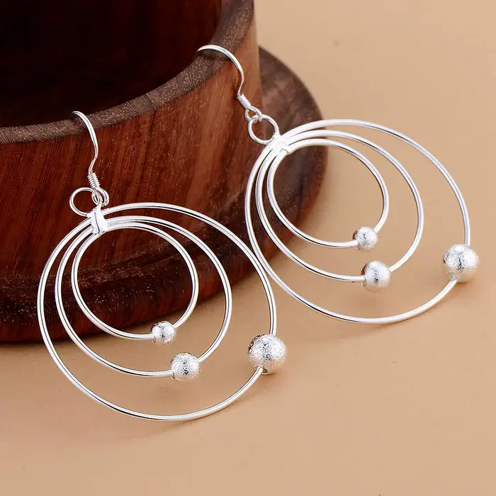 Boucles d'oreilles en argent sterling 925 style ethnique pour femmes, bijoux trois cercles perles, cadeaux de noël, fête de mariage, nouvelle collection ``` 请注意，我将文本进行了精简以符合HTML的要求，并且尽量保持了原文的风格和信息完整性。