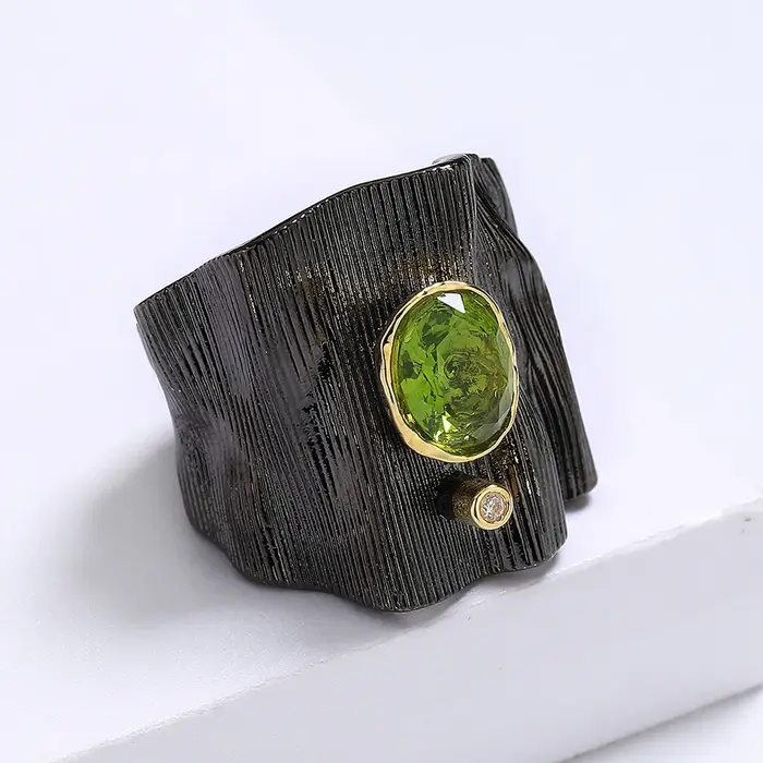 Bague exagérée en or noir pour femme