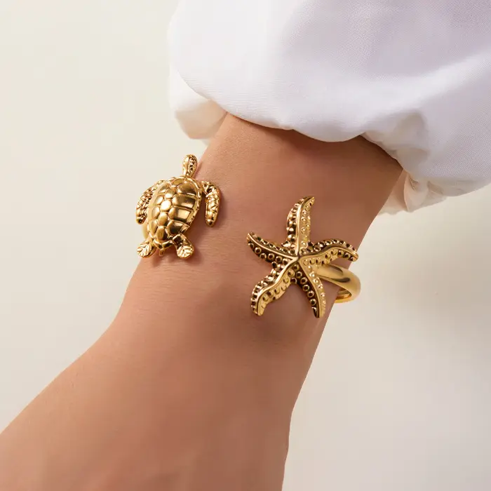 Bracelet en acier inoxydable en forme d'étoile de mer pour femmes