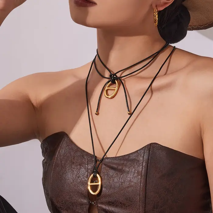 Ars – collier avec pendentif en forme de grain de café en acier inoxydable plaqué or 18 carats
