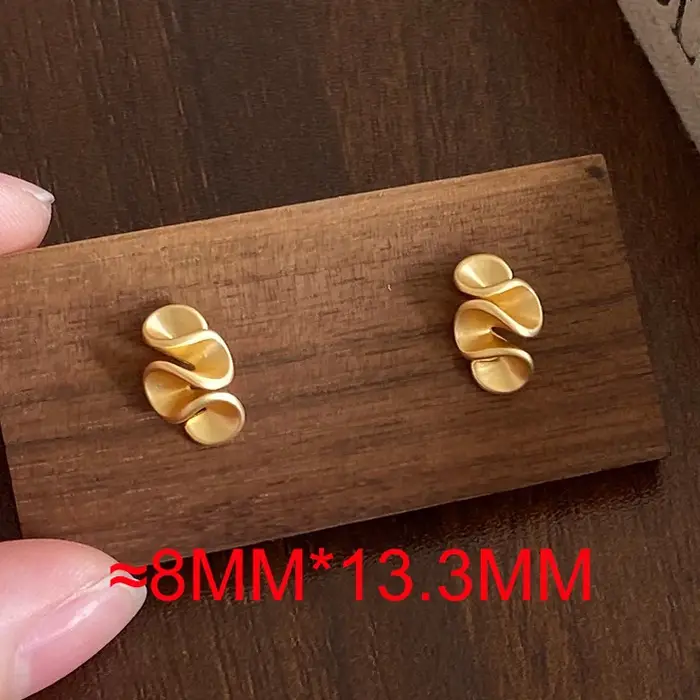 Boucles d'oreilles clous torsadées couleur argent pour femme, bijoux de mode minimalistes et tendanc