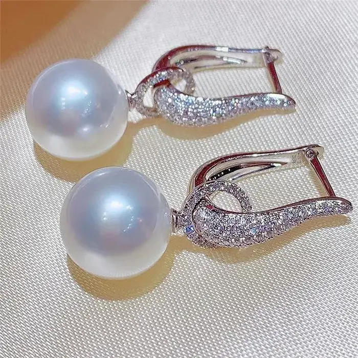 Boucles d'oreilles pendantes en zircone cubique scintillante élégantes et modernes pour femmes occasions spéciales
