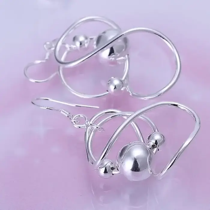 Boucles d'oreilles en argent sterling 925 pour femmes, design géométrique, élégantes et sophistiquées pour mariage et occasions spéciales