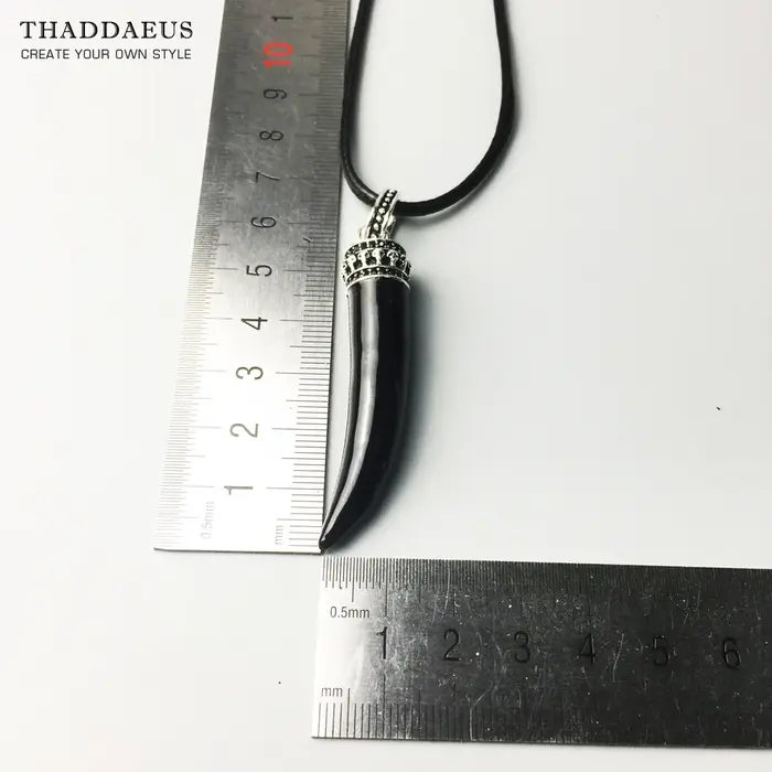 Collier de perles dent