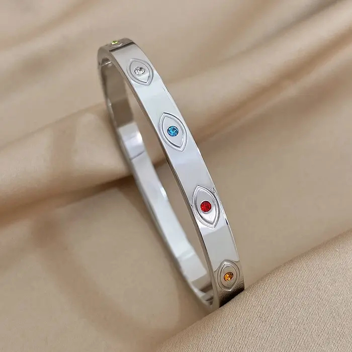 Bracelet mauvais œil exquis en acier inoxydable creux mauvais œil Bracelet à breloques décoratif bra