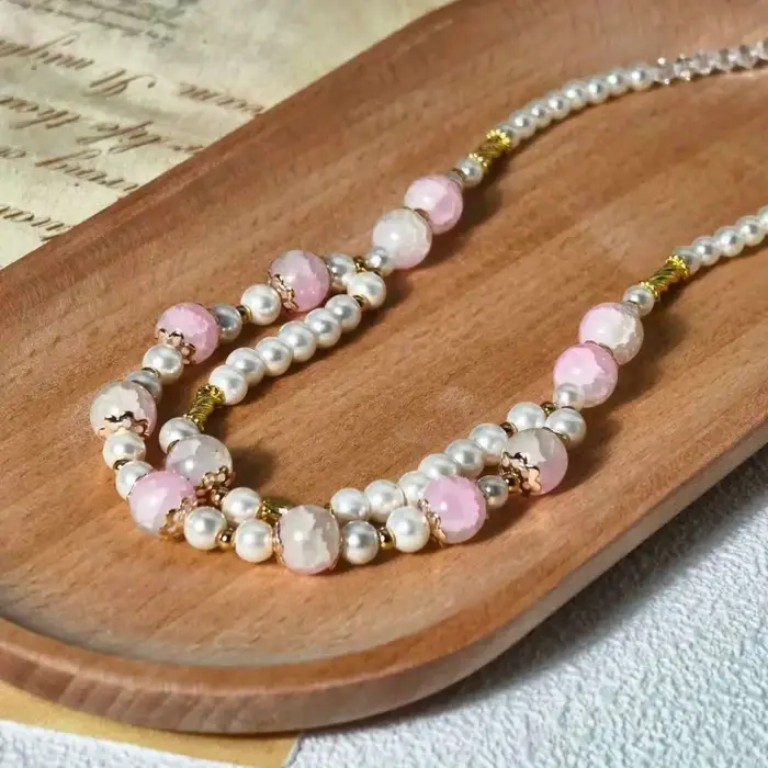 Collier à double rangée avec chaîne de perles en cristal rose