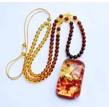 Collier avec pendentif en ambre à fleurs fines pour homme et femme, amulette en ambre de la baltique