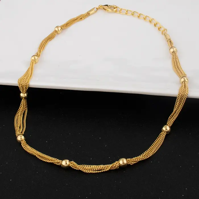 Parure de bijoux vintage NKLS pour femmes avec boucles d'oreilles, collier et bracelet, style Dubaï et Nigeria, perles rondes et pompons dorés, idéal pour les fêtes, mariages et soirées estivales