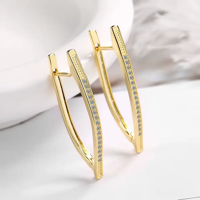 Boucle d'oreille 18 carats en or véritable