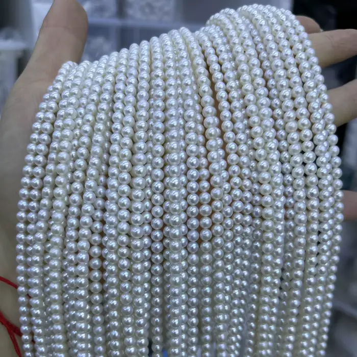 Perles d'eau douce presque rondes brillantes pour création de bijoux homme femme colliers bracelets occasions spéciales