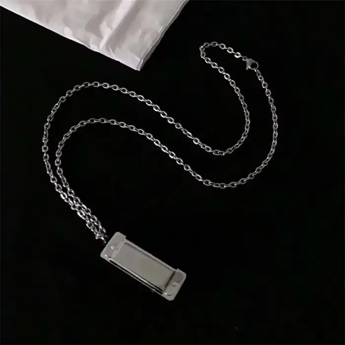 Mini-collier harmonica pour hommes et femmes, pendentif musical créatif qui peut produire du son, bi