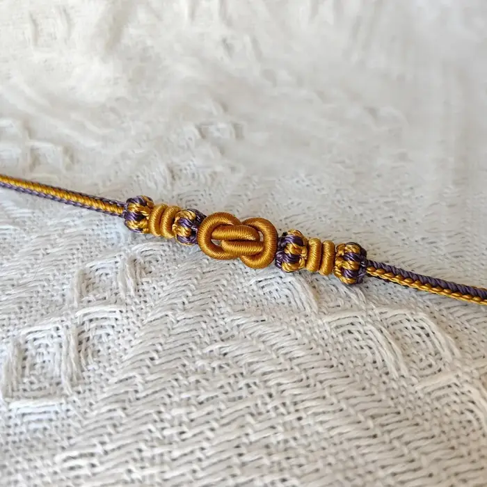 Bracelet en corde rouge tressé à la main avec nœud Yuanbao pour hommes et femmes