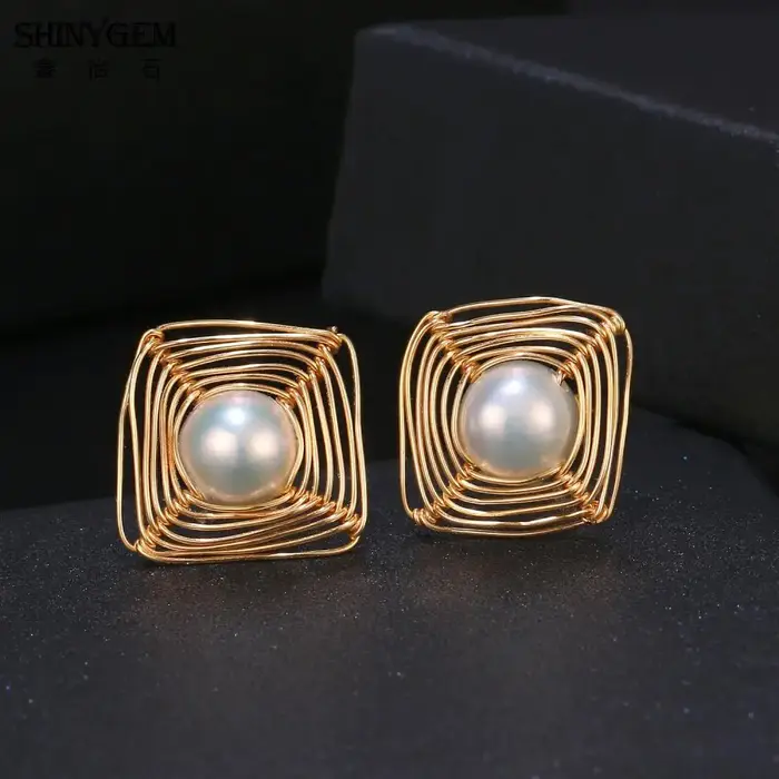 Boucles d'oreilles en perles baroques remplies d'or