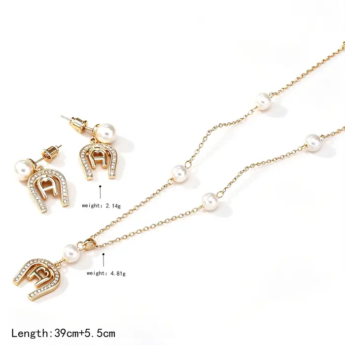 Parure de bijoux de luxe plaqué or 18 carats avec collier et boucles d'oreilles en forme de fer à cheval