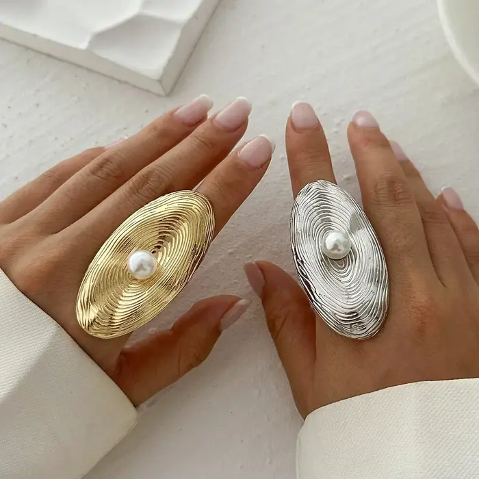 Bague cuir chevelu perle pour femme