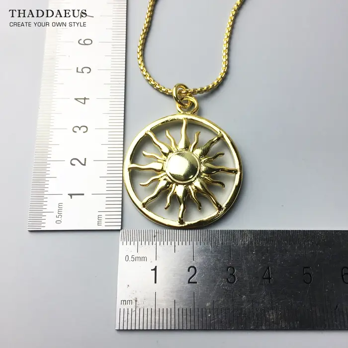 Collier pendentif couleur or soleil