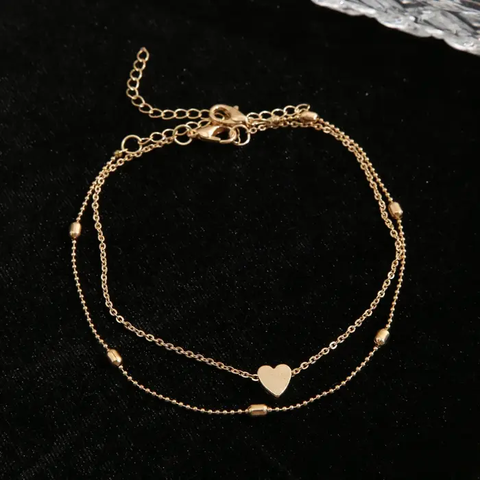 Bracelet de cheville en forme de cœur élégant pour femmes, bijou de cheville en métal or rouge à porter pour diverses occasions spéciales
