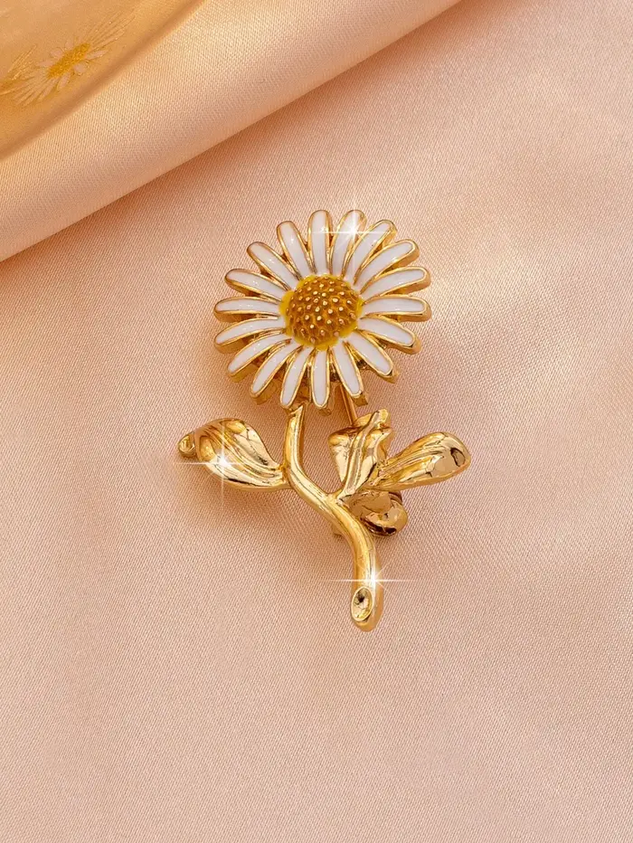 Une broche florale est un accessoire populaire