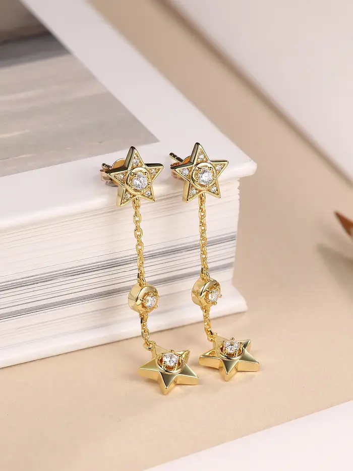 Boucles d'oreilles pendantes longues avec pompon étoile pour femme