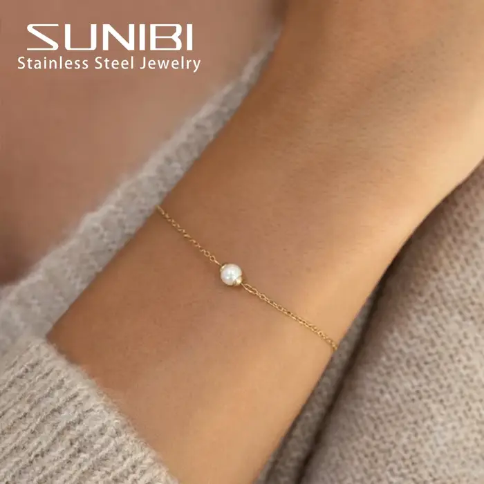 SUNIBI Bracelet en acier inoxydable pour femmes coquille de mer simulée-perle Ultra mince lien de ch