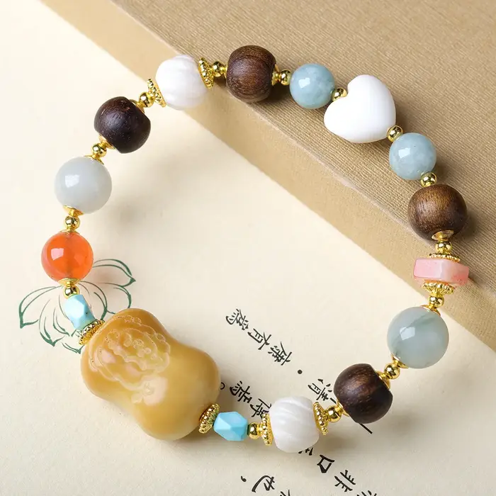 Bracelet en noix de tagua brûlée au charbon avec cœur en corne, agate rouge du Sud, jaspe de Tiansha
