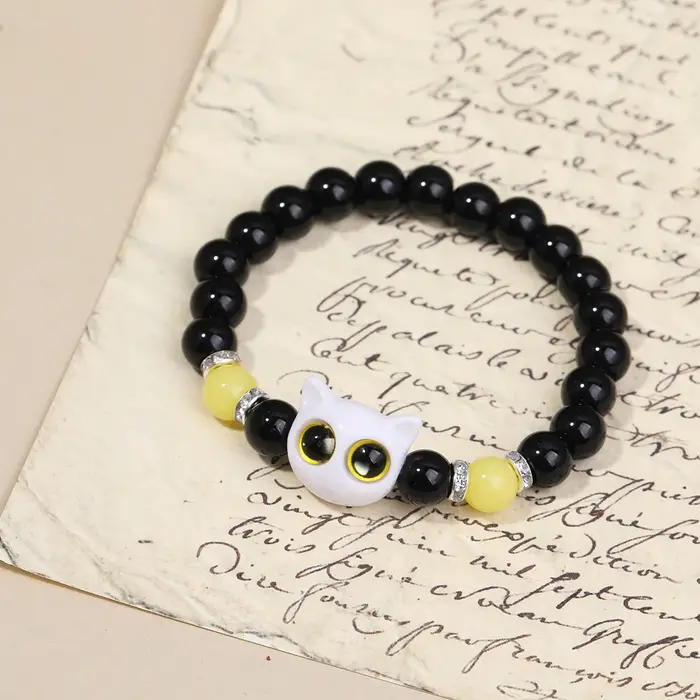 Couple de chat de dessin animé brillant avec paire de bracelets