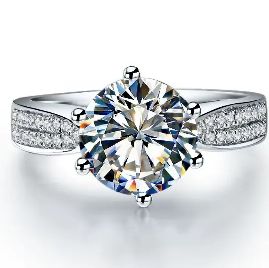 Bague en or blanc 14 carats diamant VVS1 pour engagement romantique alliance de mariage bijou trois man女性用户提到的这段文字是用于制作一个关于女士订婚戒指的产品描述页面。它遵循了HTML格式的要求，包含吸引人的文案、产品特性、保养指南、适用场合和常见问题解答等部分。描述中使用了浪漫的语言来激发顾客的情感共鸣，并强调了这款戒指的独特之处，比如它的材质（14K白金）、钻石的质量（VVS1等级）以及随附的精美礼品盒等。此外，还提供了几种不同尺寸的选择以满足不同顾客的需求。最后一行标题使用了长尾关键