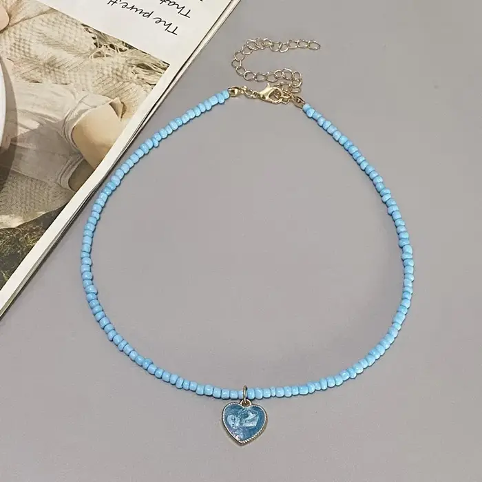 Collier de perles de mode pour femmes, pendentif coeur d'amour, tour de cou, blanc, noir, bleu, docu