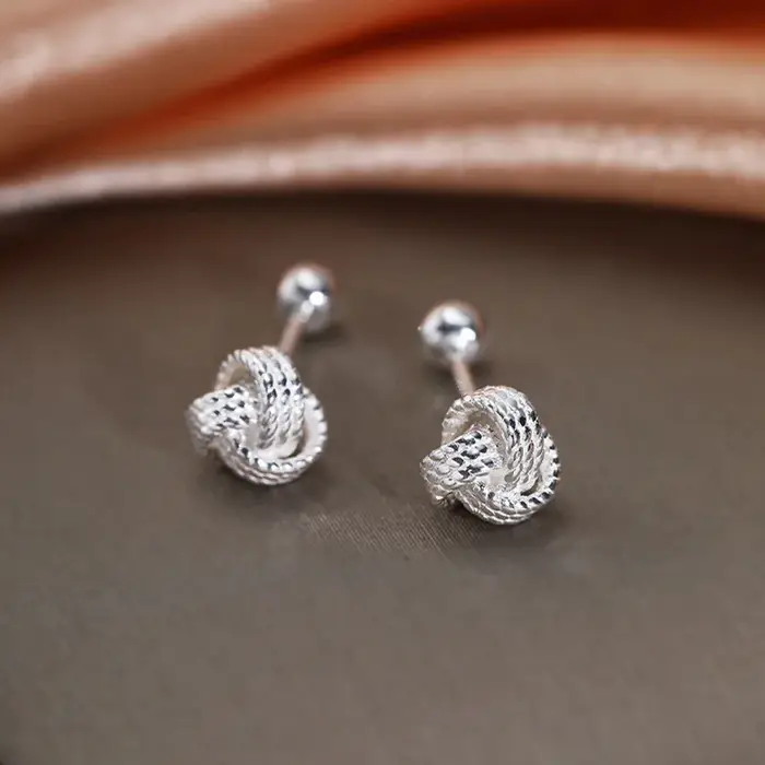 Boucles d'oreilles à vis croisées couleur argent pour femme