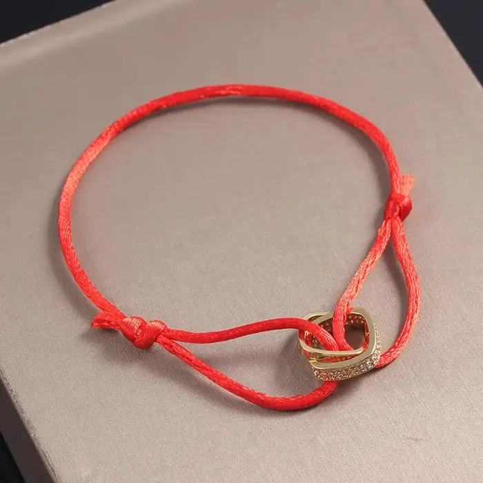 Bracelet en corde réglable avec chiffres interblocés à deux anneaux