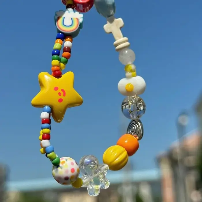 Bracelet de perles étoiles colorées douces