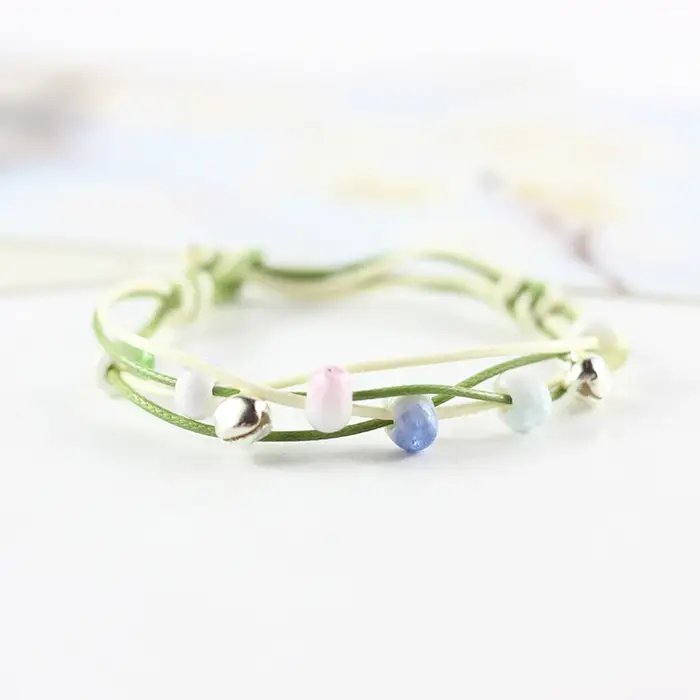Bracelet cloche en perles de céramique créatives pour femmes